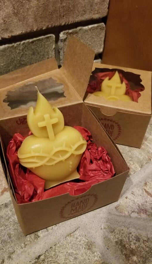 Sacred Heart candles packaged